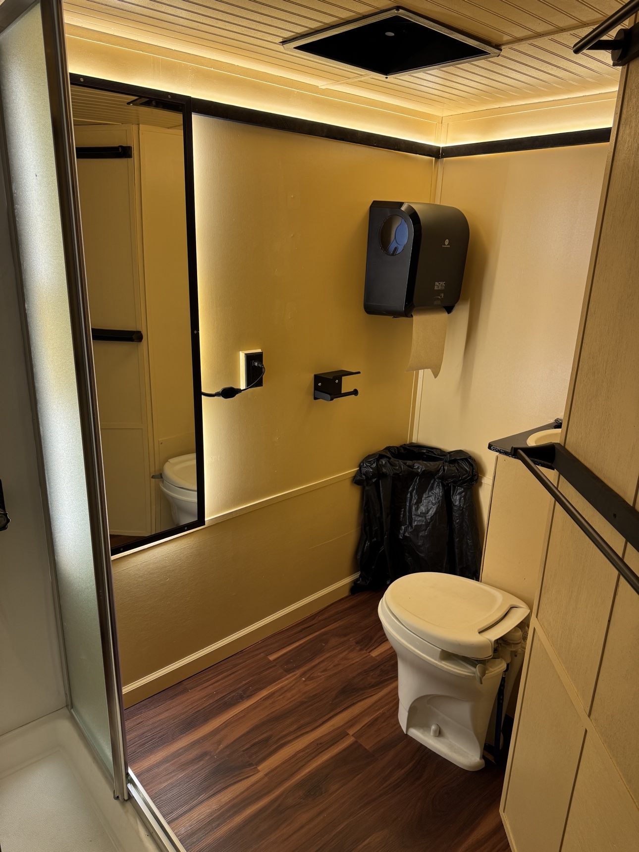 Shower and restroom area in the sauna trailer